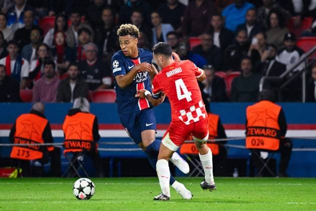 Desire Doue ( 14 - PSG ) and Arnau Martinez ( 4 - Girona ) during the UEFA Champions League match between Paris Saint Germain and Girona FC at Parc Des Princes on September 18, 2024 in Paris, France. ( Photo by federico pestellini panoramic ) - FOOTBALL : PSG vs Girona - Ligue des Champions - 18 09 2024 FedericoPestellini Panoramic 