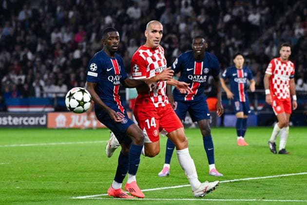 Ousmane DEMBELE ( 10 - PSG ) and Oriol Romeu ( 14 - Girona ) during the UEFA Champions League match between Paris Saint Germain and Girona FC at Parc Des Princes on September 18, 2024 in Paris, France. ( Photo by federico pestellini panoramic ) - FOOTBALL : PSG vs Girona - Ligue des Champions - 18 09 2024 FedericoPestellini Panoramic 