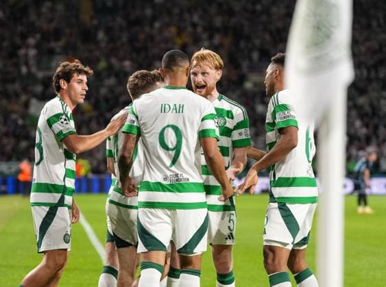 Liam Scales of Celtic celebrates with Adam Idah of Celtic after Idah scored to give Celtic a 5-1 lead. Celtic v Slovan Bratislava, UEFA Champions League, Group Stage, Football, Celtic Park, Glasgow, Scotland, UK, 18 Sep 2024 EDITORIAL USE ONLY No use with unauthorised audio, video, data, fixture lists, club league logos or live services. Online in-match use limited to 120 images, no video emulation. No use in betting, games or single club league player publications.  Copyright: xStuartxWallace Shutterstockx 14722221bp