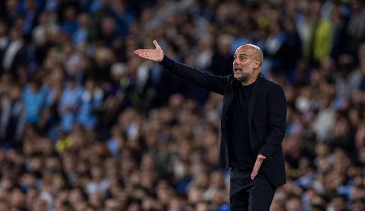 (240919) -- MANCHESTER, Sept. 19, 2024 -- Manchester City s head coach Pep Guardiola gestures during the UEFA Champions League match between Manchester City and Inter Milan in Manchester, Britain, on Sept. 18, 2024. (SP)BRITAIN-MANCHESTER-FOOTBALL-UEFA CHAMPIONS LEAGUE-MANCHESTER CITY VS INTER MILAN LixYing 