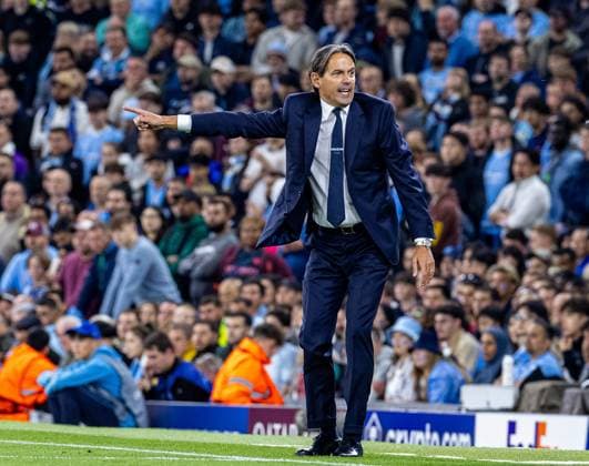 (240919) -- MANCHESTER, Sept. 19, 2024 -- Inter Milan s head coach Simone Inzaghi gestures during the UEFA Champions League match between Manchester City and Inter Milan in Manchester, Britain, on Sept. 18, 2024. (SP)BRITAIN-MANCHESTER-FOOTBALL-UEFA CHAMPIONS LEAGUE-MANCHESTER CITY VS INTER MILAN LixYing 