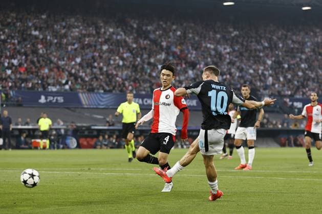 ROTTERDAM - (l-r) Inbeom Hwang of Feyenoord, Florian Wirtz of Bayer 04 Leverkusen scores the 0-3 during the UEFA Champions League match between Feyenoord Rotterdam and Bayer 04 Leverkusen at Feyenoord Stadium de Kuip on Sept. 19, 2024 in Rotterdam, Netherlands. ANP MAURICE VAN STEEN UEFA Champions League 2024 25 xVIxANPxSportx xxANPxIVx 508863288 originalFilename: 508863288.jpg