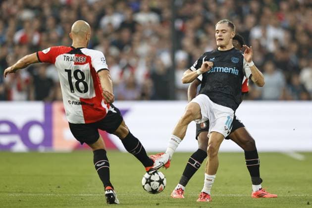 ROTTERDAM - (l-r) Gernot Trauner of Feyenoord, Florian Wirtz of Bayer 04 Leverkusen , Antoni Milambo of Feyenoord during the UEFA Champions League match between Feyenoord Rotterdam and Bayer 04 Leverkusen at Feyenoord Stadion de Kuip on Sept. 19, 2024 in Rotterdam, Netherlands. ANP MAURICE VAN STEEN UEFA Champions League 2024 25 xVIxANPxSportx xxANPxIVx 508863896 originalFilename: 508863896.jpg