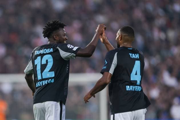 19 09 2024, Football, Season 2024 2025, UEFA Champions League, Matchday 1, Feyenoord Rotterdam Bayer 04 Leverkusen, f l Edmond Tapsoba Bayer 04 Leverkusen , Jonathan Tah Bayer 04 Leverkusen celebrate the goal to 0 4, Rotterdam De Kuip Stadion Feijenoord Netherlands xRHR PHOTO DEx Copyright: DennisxEwert RHR-FOTOx RHR-FOTO DE