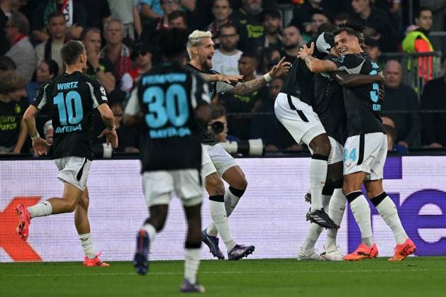 Rotterdam, De Kuip, 19 09 24, GER, Men, UEFA Champions League, Season 2024 2025, Feyenoord Rotterdam Bayer 04 Leverkusen Picture Edmond TAPSOBA Leverkusen cheers after his goal to 0 4 Only for editorial use UEFA regulations prohibit any use of photographs as image sequences and or quasi video Suedholland Netherlands