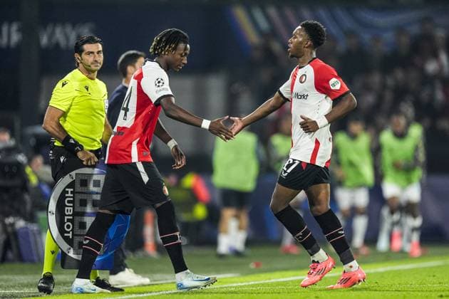 UEFA Champions League: Feyenoord v Bayer 04 Leverkusen Rotterdam - Chris-Kevin Nadje of Feyenoord, Antoni Milambo of Feyenoord during the first round of new format of the Champions League 2024 2025. The match is set between Feyenoord and Bayer 04 Leverkusen at Stadion Feijenoord De Kuip on 19 September 2024 in Rotterdam, The Netherlands. Copyright: xTomxBodex