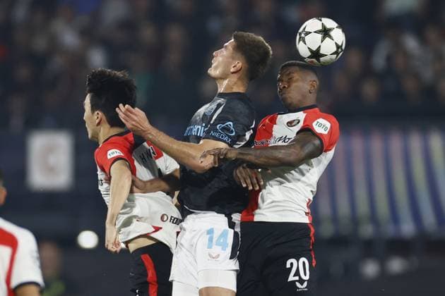 ROTTERDAM - (l-r) Inbeom Hwang of Feyenoord, Patrik Schick of Bayer 04 Leverkusen , Jeyland Mitchell of Feyenoord during the UEFA Champions League match between Feyenoord Rotterdam and Bayer 04 Leverkusen at Feyenoord Stadium de Kuip on Sept. 19, 2024 in Rotterdam, Netherlands. ANP PIETER STAM DE JONGE UEFA Champions League 2024 25 xVIxANPxSportx xxANPxIVx 508868798 originalFilename: 508868798.jpg