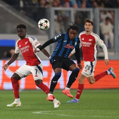 Bergamo, Italy, 19th September 2024. Kai Havertz of Arsenal FC looks on as Ademola Lookman of Atalanta battles for possession with Bukayo Saka of Arsenal FC during the UEFA Champions League match at Gewiss Stadium, Bergamo. Picture credit should read: Jonathan Moscrop Sportimage EDITORIAL USE ONLY. No use with unauthorised audio, video, data, fixture lists, club league logos or live services. Online in-match use limited to 120 images, no video emulation. No use in betting, games or single club league player publications. SPI-3299-0002