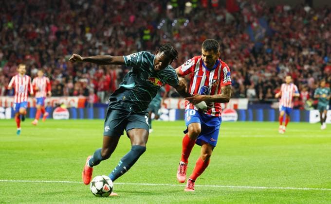 Atletico Madrid RB Leipzig Champions League Madrid, 19 09 2024, Estadio Wanda Metropolitano, Soccer, UEFA Champions League, Matchday 1 , Atletico Madrid vs RB Leipzig , Pictured from left Castello Lukeba 23, RB Leipzig and Angel Correa 10, Atletico , Only editorial use Photo intended for editorial use only , UEFA regulations prohibit any use of photographs as image sequences and or quasi video , Picture Point