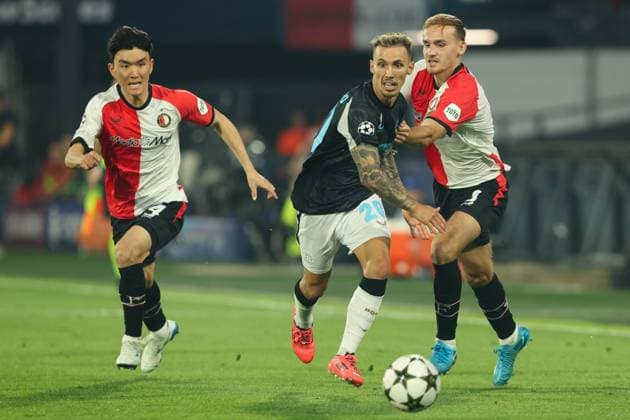 2024-09-19 Feyenoord v Bayer 04 Leverkusen - Champions League - League phase - Matchday 1 ROTTERDAM, NETHERLANDS - SEPTEMBER 19: Alejandro Grimaldo of Bayer 04 Leverkusen is challenged by Thomas Beelen of Feyenoord during the Champions League - League phase - Matchday 1 match between Feyenoord and Bayer 04 Leverkusen at Stadion Feijenoord on September 19, 2024 in Rotterdam, Netherlands. (Photo by Hans van der Valk BSR Agency) Rotterdam Netherlands Content not available for redistribution in The Netherlands directly or indirectly through any third parties. Copyright: xBSRxAgencyx