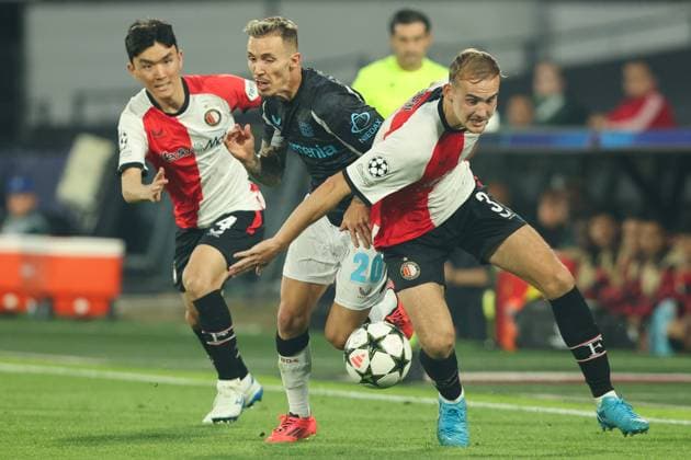2024-09-19 Feyenoord v Bayer 04 Leverkusen - Champions League - League phase - Matchday 1 ROTTERDAM, NETHERLANDS - SEPTEMBER 19: Alejandro Grimaldo of Bayer 04 Leverkusen battles for the ball with Inbeom Hwang of Feyenoord, Thomas Beelen of Feyenoord during the Champions League - League phase - Matchday 1 match between Feyenoord and Bayer 04 Leverkusen at Stadion Feijenoord on September 19, 2024 in Rotterdam, Netherlands. (Photo by Hans van der Valk BSR Agency) Rotterdam Netherlands Content not available for redistribution in The Netherlands directly or indirectly through any third parties. Copyright: xBSRxAgencyx