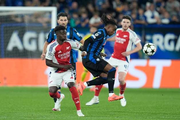 Bukayo Saka (Arsenal FC) and Ademola Lookman (Atalanta BC) battle for the ball, UEFA Champions League 2024 25 League Phase MD1, Atalanta BC v Arsenal FC, Gewiss Stadium, September 19, 2024, Bergamo, Italy.