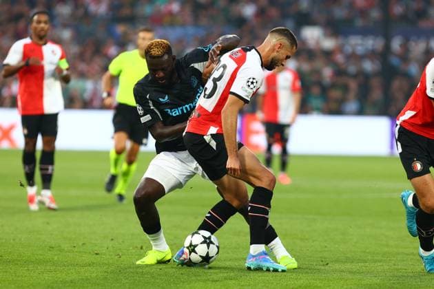 Anis Hadj Moussa 23 Feyenoord Rotterdam in duel, action, with Victor Boniface 22 Bayer 04 Leverkusen Feyenoord Rotterdam vs Bayer 04 Leverkusen, UEFA Champions League, Soccer, Matchday 1, Season 2024 2025, 19 09 2024 Photo kolbert press Ant Palmer Stadion Rotterdam De Kuip Netherlands Copyright: xkolbert-press AntxPalmerx