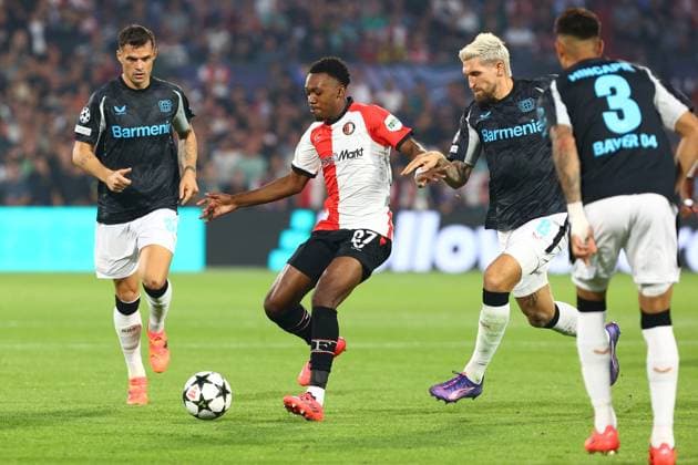 Antoni Milambo 27 Feyenoord Rotterdam in duel, action, with Robert Andrich 8 Bayer 04 Leverkusen Feyenoord Rotterdam vs Bayer 04 Leverkusen, UEFA Champions League, Soccer, Matchday 1, Season 2024 2025, 19 09 2024 Photo kolbert press Ant Palmer Stadion Rotterdam De Kuip Netherlands Copyright: xkolbert-press AntxPalmerx