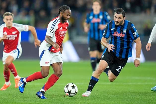 Raheem Sterling of Arsenal competes for the ball with Sead Kolasinac of Atalanta BC during the Uefa Champions League match between Atalanta BC and Arsenal at Gewiss Stadium Bergamo Italy on 19 September 2024. Bergamo Gewiss Stadium Bergamo Italy Copyright: xPhotoxGoalxPixx SP24-991-048