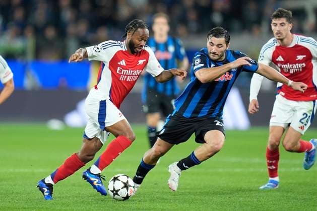 Raheem Sterling of Arsenal competes for the ball with Sead Kolasinac of Atalanta BC during the Uefa Champions League match between Atalanta BC and Arsenal at Gewiss Stadium Bergamo Italy on 19 September 2024. Bergamo Gewiss Stadium Bergamo Italy Copyright: xPhotoxGoalxPixx SP24-991-049