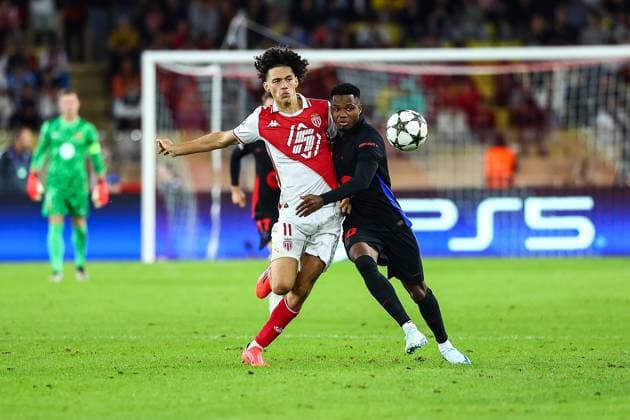 19th September 2024 - UEFA CHAMPIONS LEAGUE - MATCH 1 - SEASON 2024 2025 - AS MONACO vs FC Barcelona, Barca - STADE LOUIS II akliouche (maghnes) in action against fati (ansu) during the game MONACO MONACO Copyright: xSPORTPIXPRESSx xFREDxPORCUx