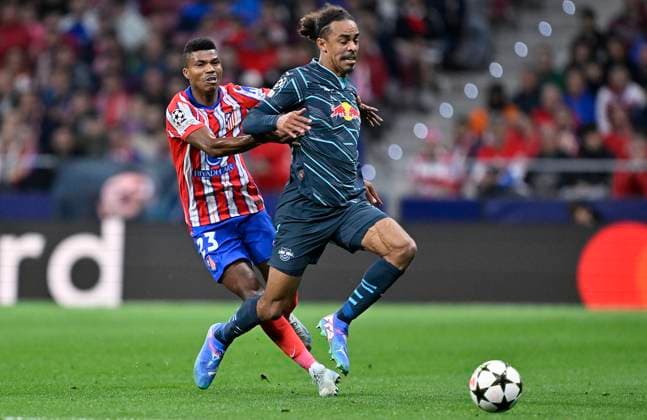 September 19, 2024, Madrid, Spain: Reinildo Mandava (L), of AtlÃ tico de Madrid and Yussuf Poulsen (R) of RB Leipzig in action during the 2024 25 UEFA Champions League Round of 16 match between AtlÃ tico de Madrid and RB Leipzig at the Civitas Metropolitano Stadium. Final score; AtlÃ tico de Madrid 2-1 RB Leipzig Madrid Spain - ZUMAs197 20240919_aaa_s197_379 Copyright: xDavidxCanalesx