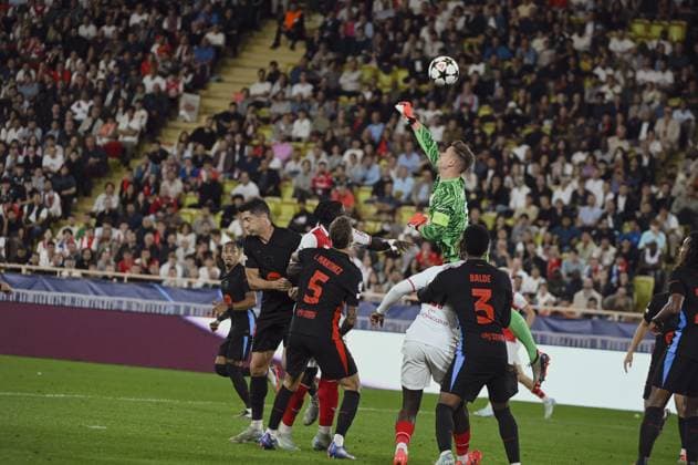 TER STEGEN Marc-andre (FC Barcelone) make a arrest. AS Monaco vs FC Barcelone UEFA Champions League in Stade Louis II, MONACO, on September 19, 2024. FOOTBALL: C1 - AS Monaco vs FC Barcelone - UEFA Champions League - 19 09 24 FredDides Panoramic 
