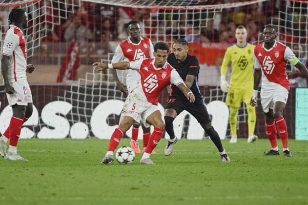 KEHRER Thilo (AS Monaco) and RAPHINHA (FC Barcelone). AS Monaco vs FC Barcelone UEFA Champions League in Stade Louis II, MONACO, on September 19, 2024. FOOTBALL: C1 - AS Monaco vs FC Barcelone - UEFA Champions League - 19 09 24 FredDides Panoramic 