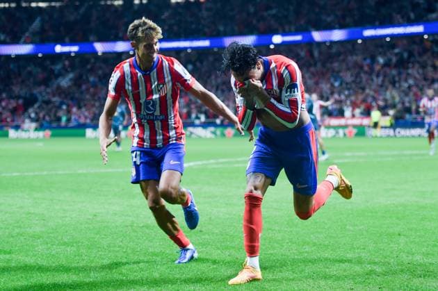 (240920) -- MADRID, Sept. 20, 2024 -- Atletico Madrid s Jose Gimenez (R) celebrates scoring during the UEFA Champions League match between Atletico Madrid and RB Leipzig in Madrid, Spain, on Sept. 19, 2024. (Photo by Xinhua) (SP)SPAIN-MADRID-FOOTBALL-UEFA CHAMPIONS LEAGUE-ATLETICO MADRID VS RB LEIPZIG GustavoxValiente 