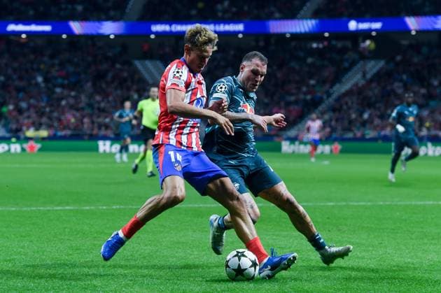 (240920) -- MADRID, Sept. 20, 2024 -- Atletico Madrid s Marcos Llorente (L) vies with RB Leipzig s David Raum during the UEFA Champions League match between Atletico Madrid and RB Leipzig in Madrid, Spain, on Sept. 19, 2024. (Photo by Xinhua) (SP)SPAIN-MADRID-FOOTBALL-UEFA CHAMPIONS LEAGUE-ATLETICO MADRID VS RB LEIPZIG GustavoxValiente 