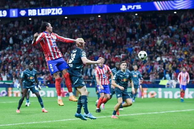 (240920) -- MADRID, Sept. 20, 2024 -- Atletico Madrid s Jose Gimenez (1st L) scores a goal during the UEFA Champions League match between Atletico Madrid and RB Leipzig in Madrid, Spain, on Sept. 19, 2024. (Photo by Xinhua) (SP)SPAIN-MADRID-FOOTBALL-UEFA CHAMPIONS LEAGUE-ATLETICO MADRID VS RB LEIPZIG GustavoxValiente 