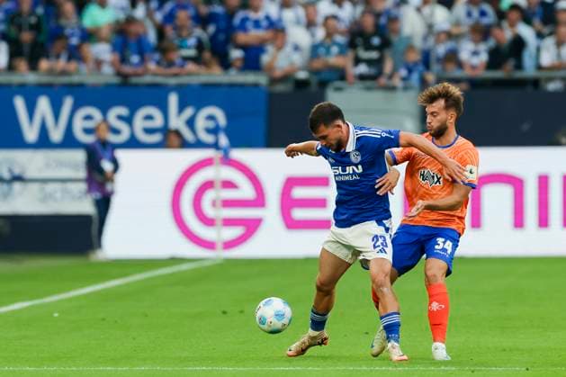 Mehmet Can Aydin FC Schalke 04 and Killian Corredor SV Darmstadt 98 battle for the ball, 2 Bundesliga, FC Schalke 04 vs SV Darmstadt 98, Veltins Arena, September 20, 2024 in Gelsenkirchen, Germany Photo by Marco Steinbrenner DeFodi Images Mehmet Can Aydin FC Schalke 04 and Killian Corredor SV Darmstadt 98 battle for the ball, 2 Bundesliga, FC Schalke 04 vs SV Darmstadt 98, Veltins Arena, September 20, 2024 in Gelsenkirchen, Germany Photo by Marco Steinbrenner DeFodi Images DFB DFL REGULATIONS PROHIBIT ANY USE OF PHOTOGRAPHS AS IMAGE SEQUENCES AND OR QUASI VIDEO Defodi 700 schalke darm 20240920 026 Defodi-700 DFB DFL REGULATIONS PROHIBIT ANY USE OF PHOTOGRAPHS AS IMAGE SEQUENCES AND OR QUASI-VIDEO.