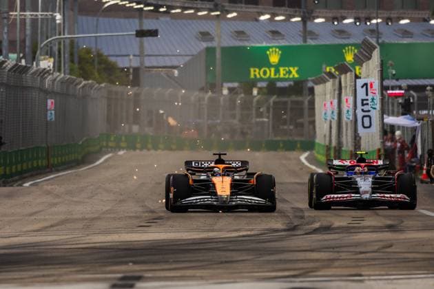 Marina Bay Street Circuit, Singapore, Singapore. 20.September.2024; Oscar Piastri and Yuki Tsunoda during Formula One Singapore Grand Prix  (267234601)