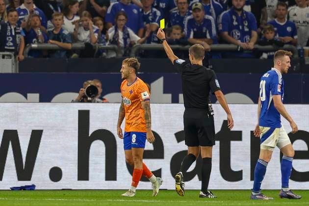 Gelsenkirchen, Germany, 20 09 24 Luca Marseiler SV Darmstadt 98 receives a yellow card during the 2 Bundesliga match between FC Schalke 04 and SV Darmstadt 98 at the Veltins Arena Gelsenkirchen Veltins Arena North Rhine Westphalia Germany Copyright: xBrauer-Fotoagenturx xAdrianxSchlx