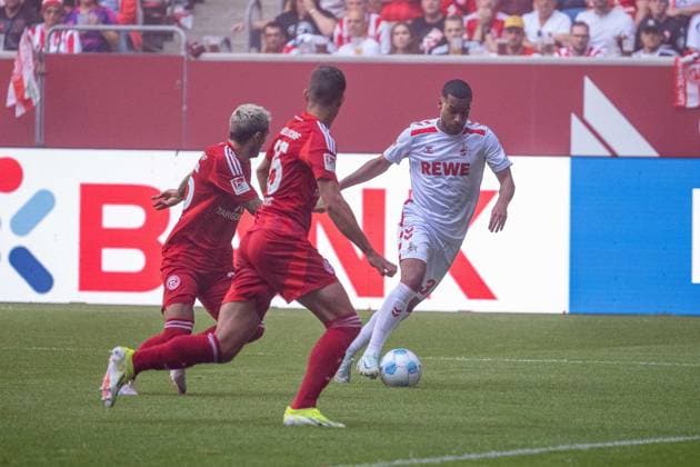 21 09 2024, Soccer 2 Bundesliga, Season 2024 2025, Matchday 06, Fortuna Duesseldorf vs 1 FC Koeln in the Merkur Spiel Arena Rhein in Duesseldorf duel between Matthias Zimmermann Fortuna Duesseldorf, 25 , Linton Maina 1 FC Koeln, 37 and Tim Oberdorf Fortuna Duesseldorf, 15 Important note In accordance with the regulations of the DFL German Football League and the DFB German Football Association, it is prohibited to utilize or have utilized photographs taken in the stadium and or of the match in the form of sequential images and or video-like photo series Foto Kirchner Media TH Copyright: xKirchner-Media THx