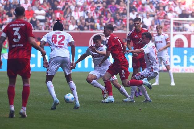 in duel, action, with Isak Bergmann Johannesson 8 Fortuna Duesseldorf Eric Martel 6 1 FC Koeln Fortuna Duesseldorf vs 1 FC Koeln, Football, 2 Bundesliga, 6 Matchday, Season 2024 2025, 21 09 2024 DFL REGULATIONS PROHIBIT ANY USE OF PHOTOGRAPHS AS IMAGE SEQUENCES AND OR QUASI VIDEO Foto kolbert press Ant Palmer Merkur Spiel Arena NRW Germany Copyright: xkolbert-press AntxPalmerx