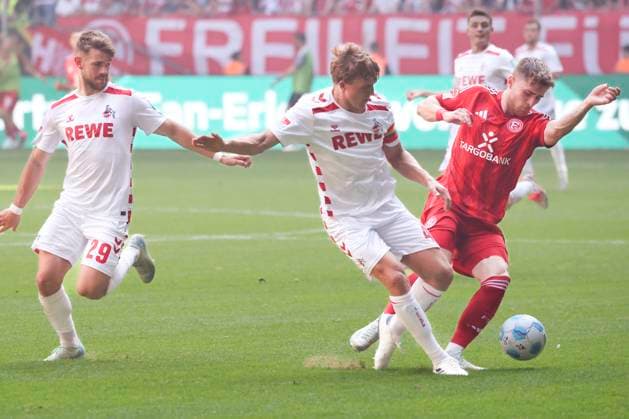 GER, 2 FBL Fortuna Duesseldorf vs 1 FC Koeln 21 09 2024, Merkur Spiel Arena, Duesseldorf, GER, 2 FBL Fortuna Duesseldorf vs 1 FC Koeln, in the picture Jan Thielmann FC Koeln 29 , Timo Hübers Huebers FC Koeln 4 , Tim Rossmann Fortuna Duesseldorf 21 , nordphotoxGmbHx xMeuter nph00351