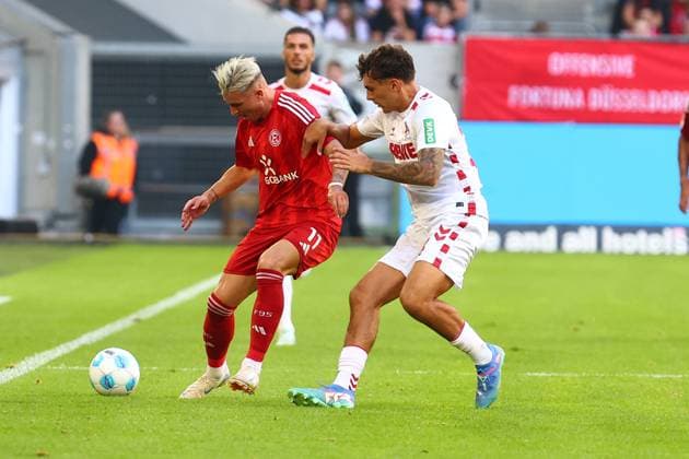 Felix Klaus 11 Fortuna Duesseldorf in duel, action, with Luca Waldschmift 9 1 FC Koeln Fortuna Duesseldorf vs 1 FC Koeln, Football, 2 Bundesliga, Matchday 6, Season 2024 2025, 21 09 2024 DFL REGULATIONS PROHIBIT ANY USE OF PHOTOGRAPHS AS IMAGE SEQUENCES AND OR QUASI VIDEO Foto kolbert press Ant Palmer Merkur Spiel Arena NRW Germany Copyright: xkolbert-press AntxPalmerx