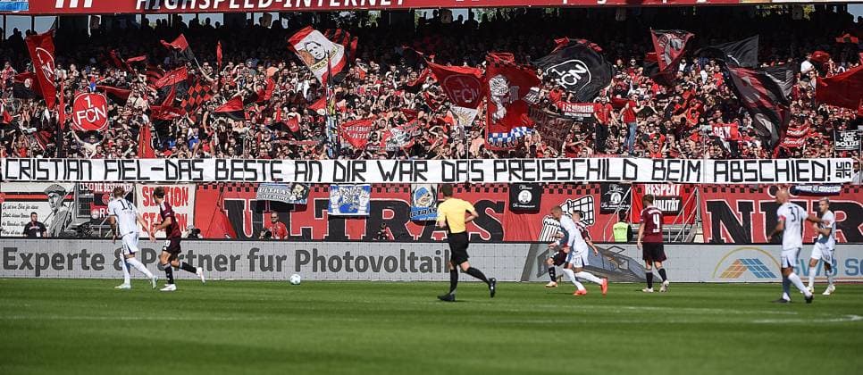21 09 2024, xhbx, Soccer 2 Bundesliga, 1 FC Nuernberg Hertha BSC Berlin emspor, v l Fans, Scarves, Banner against EX Coach Coach Cristian Fiel Hertha BSC Berlin , Flags of 1 FC Nuernberg DFL DFB REGULATIONS PROHIBIT ANY USE OF PHOTOGRAPHS as IMAGE SEQUENCES and or QUASI VIDEO Nuernberg
