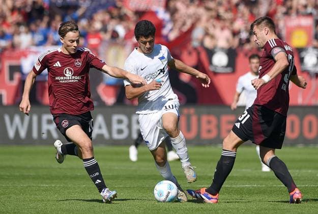 21 09 2024, xhbx, Soccer 2 Bundesliga, 1 FC Nuernberg Hertha BSC Berlin emspor, v l Caspar Jander 1 FC Nuernberg , Ibrahim Maza Hertha BSC Berlin , Robin Knoche 1 FC Nuernberg DFL DFB REGULATIONS PROHIBIT ANY USE OF PHOTOGRAPHS as IMAGE SEQUENCES and or QUASI VIDEO Nuernberg