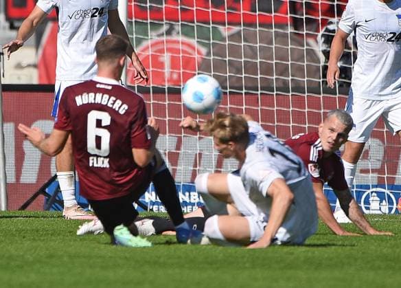 21 09 2024, xhbx, Soccer 2 Bundesliga, 1 FC Nuernberg Hertha BSC Berlin emspor, v l Florian Flick 1 FC Nuernberg , Luca Schuler Hertha BSC Berlin DFL DFB REGULATIONS PROHIBIT ANY USE OF PHOTOGRAPHS as IMAGE SEQUENCES and or QUASI VIDEO Nuernberg