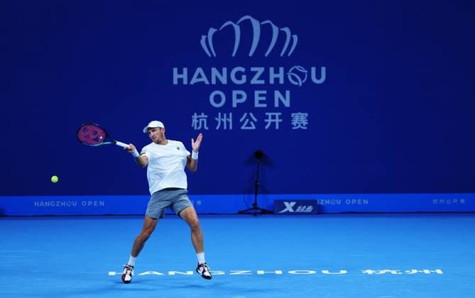 HANGZHOU, CHINA - SEPTEMBER 21: Mitchell Krueger of United States competes in the Men s Singles Round of 16 match against Roberto Carballes Baena of Spain on day 4 of 2024 Hangzhou Open at the Hangzhou Olympic Sports Expo Center on September 21, 2024 in Hangzhou, Zhejiang Province of China.  Copyright: xVCGx 111519298373