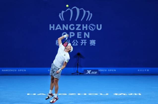 HANGZHOU, CHINA - SEPTEMBER 21: Mitchell Krueger of United States competes in the Men s Singles Round of 16 match against Roberto Carballes Baena of Spain on day 4 of 2024 Hangzhou Open at the Hangzhou Olympic Sports Expo Center on September 21, 2024 in Hangzhou, Zhejiang Province of China.  Copyright: xVCGx 111519298371