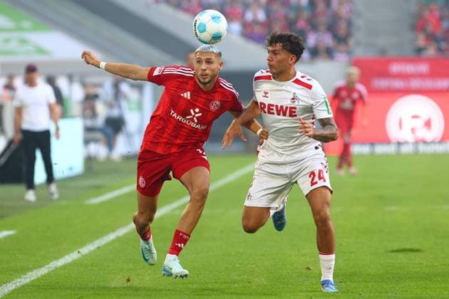 Jona Niemiec 18 Fortuna Duesseldorf in duel, action, with Julian Pauli 24 1 FC Koeln Fortuna Duesseldorf vs 1 FC Koeln, Football, 2 Bundesliga, Matchday 6, Season 2024 2025, 21 09 2024 DFL REGULATIONS PROHIBIT ANY USE OF PHOTOGRAPHS AS IMAGE SEQUENCES AND OR QUASI VIDEO Foto kolbert press Ant Palmer Merkur Spiel Arena NRW Germany Copyright: xkolbert-press AntxPalmerx