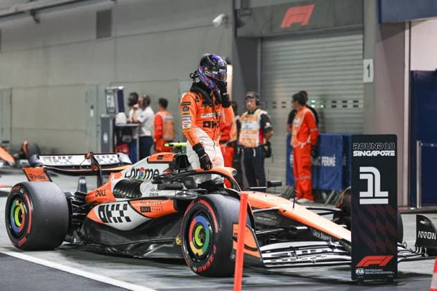(240921) -- SINGAPORE, Sept. 21, 2024 -- McLaren s British driver Lando Norris reacts after the qualifying session at the Formula 1 Singapore Grand Prix 2024 at Marina Bay Street Circuit, Singapore, Sept. 21, 2024. (Photo by Qian Jun Xinhua) (SP)SINGAPORE-F1-SINGAPORE GRAND PRIX 2024-QUALIFYING HexChangshan 