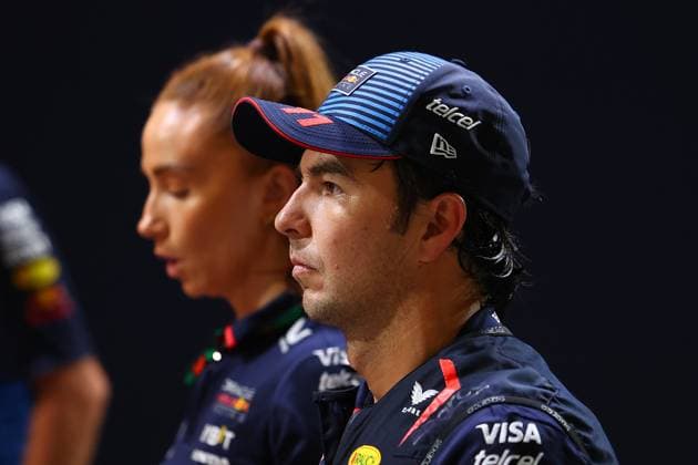 F1 Grand Prix Of Singapore - Qualifying Sergio Perez of Mexico and Red Bull Racing-Honda RBPT reacts during qualifying ahead of the F1 Grand Prix of Singapore at Marina Bay Street Circuit in Singapore, Singapore, on September 21, 2024. Singapore Singapore  Copyright: xMorganxHancockx originalFilename:hancock-f1grandp240921_np46F.jpg