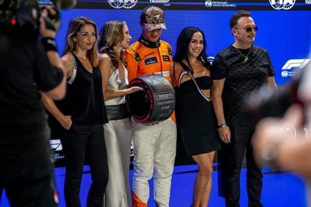 MARINA BAY, SINGAPORE: The Corrs and Lando Norris, racing for the McLaren F1 team during the 2024 Formula 1 Singapore Grand Prix at the Marina Bay Street Circuit in Marina Bay, Singapore
