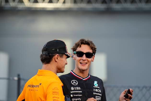 September 22, 2024, Singapore, Singapore: British driver LANDO NORRIS (McLaren F1 Team) and British driver GEORGE RUSSEL (Mercedes-AMG F1 Team) are seen during the drivers parade prior to the 2024 FIA Formula 1 Singapore Grand Prix at Marina Bay Street Circuit in Singapore. Singapore Singapore - ZUMAg147 20240922_fap_g147_010 Copyright: xJamesxGasperottix
