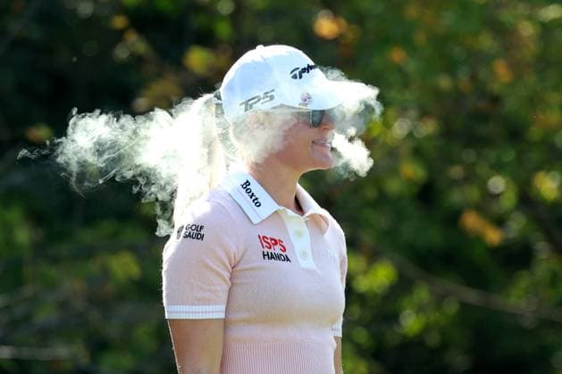 CINCINNATI, OH - SEPTEMBER 22: LPGA, Golf Damen golfer Charley Hull smokes a cigarette while waiting on the 8th tee during the final round of the Kroger Queen City Championship presented by P&G on September 22, 2024, at TPC River™s Bend in Cincinnati, Ohio. (Photo by Brian Spurlock Icon Sportswire) GOLF: SEP 22 LPGA Kroger Queen City Championship pres by P&G EDITORIAL USE ONLY Icon24092224