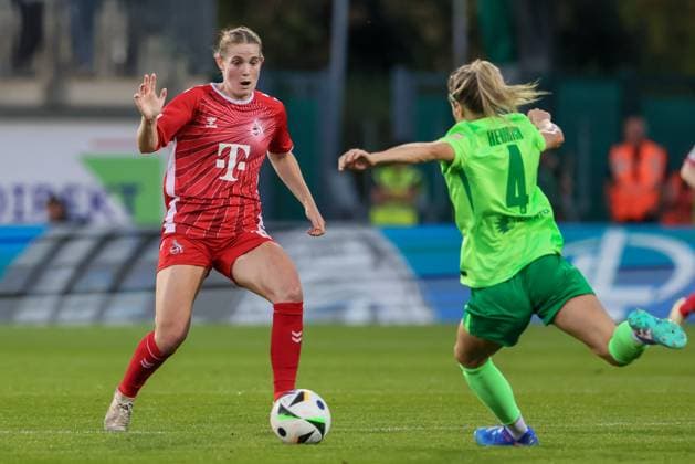 from left Taylor Ziemer 1 FC Köln, 18 and Kathrin Hendrich VfL Wolfsburg, 4 in a duel, dynamic, action, action, game scene, THE DFB REGULATIONS PROHIBIT ANY USE OF PHOTOGRAPHS AS IMAGE SEQUENCES AND OR QUASI VIDEO , 22 09 2024, Wolfsburg Germany , Football, Google Pixel Womens Bundesliga, VfL Wolfsburg 1 FC Köln xobx