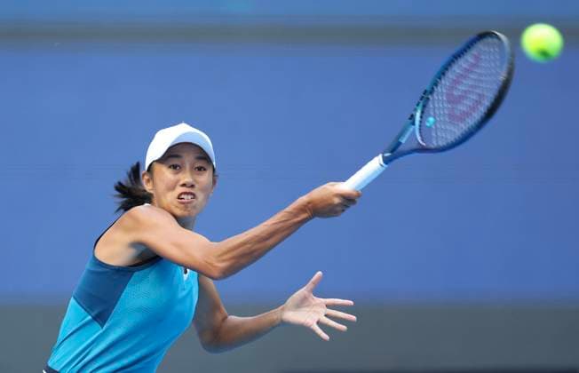 (240925) -- BEIJING, Sept. 25, 2024 -- Zhang Shuai of China hits a return during the women s singles first round match against Mccartney Kessler of the United States at the 2024 China Open tennis tournament in Beijing, capital of China, Sept. 25, 2024. ) (SP)CHINA-BEIJING-TENNIS-CHINA OPEN-WOMEN S SINGLES (CN) BaixXuefei 