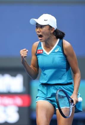 (240925) -- BEIJING, Sept. 25, 2024 -- Zhang Shuai of China celebrates scoring during the women s singles first round match against Mccartney Kessler of the United States at the 2024 China Open tennis tournament in Beijing, capital of China, Sept. 25, 2024. ) (SP)CHINA-BEIJING-TENNIS-CHINA OPEN-WOMEN S SINGLES (CN) BaixXuefei 