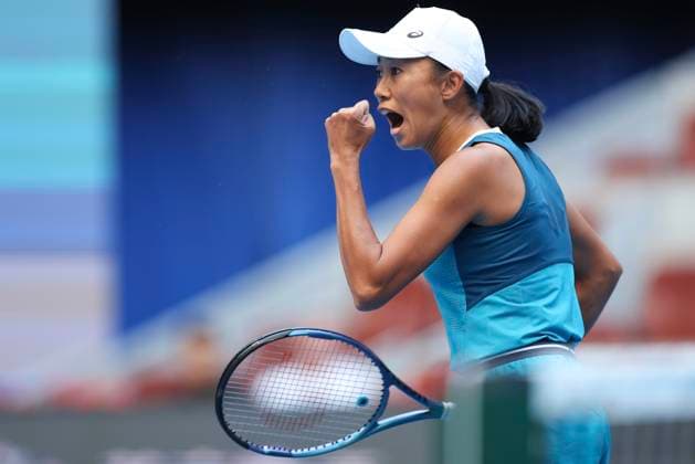 (240925) -- BEIJING, Sept. 25, 2024 -- Zhang Shuai of China celebrates scoring during the women s singles first round match against Mccartney Kessler of the United States at the 2024 China Open tennis tournament in Beijing, capital of China, Sept. 25, 2024. ) (SP)CHINA-BEIJING-TENNIS-CHINA OPEN-WOMEN S SINGLES (CN) BaixXuefei 