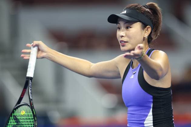 (240925) -- BEIJING, Sept. 25, 2024 -- Wang Qiang of China reacts during the women s singles first round match against Alycia Parks of the United States at 2024 China Open tennis tournament in Beijing, capital of China, Sept. 25, 2024. ) (SP)CHINA-BEIJING-TENNIS-CHINA OPEN-WOMEN S SINGLES (CN) BaixXuefei 